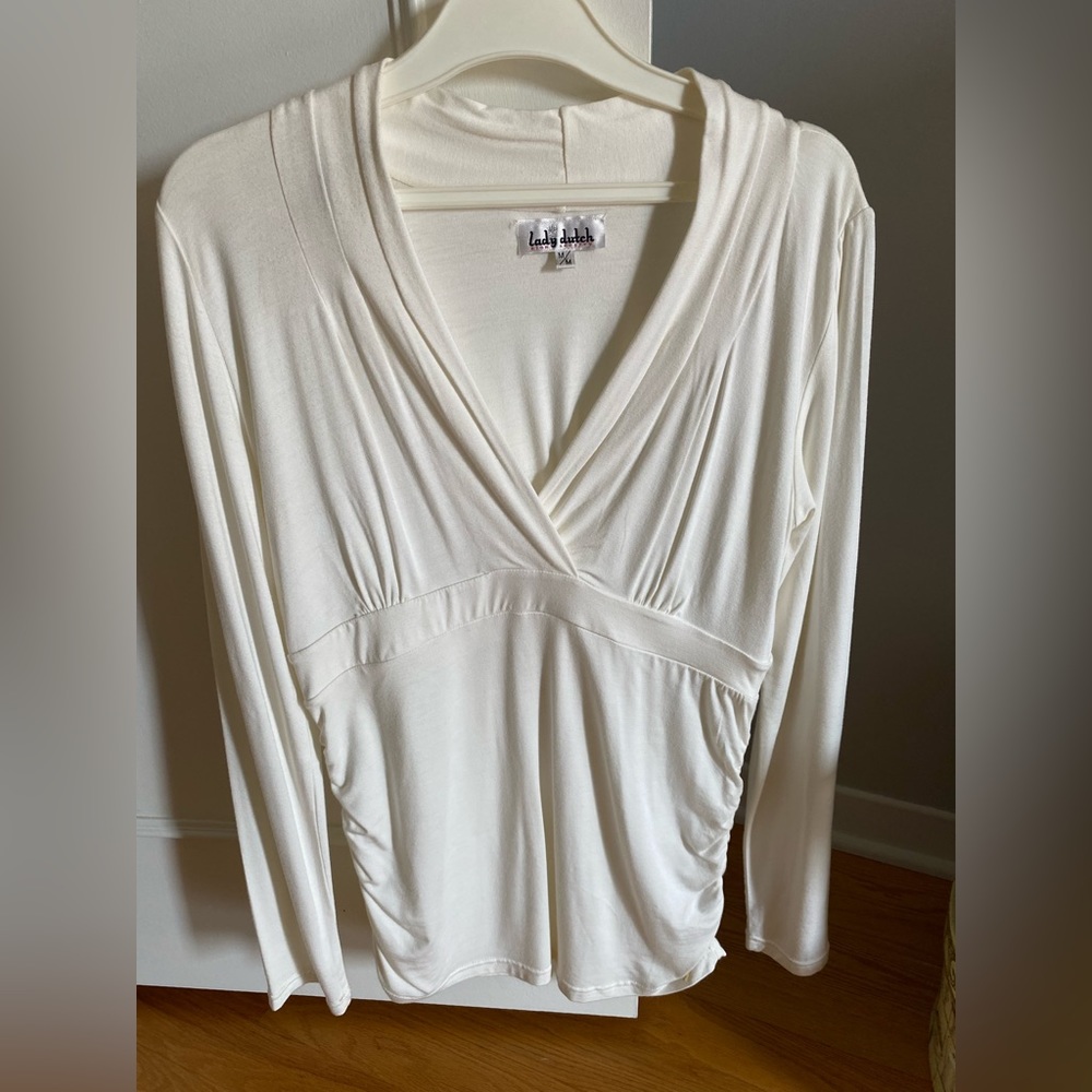 Beige top.